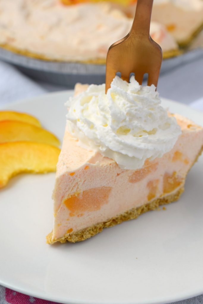 You'll love the flavors that blend together in this lovely Amaretto Peach No Bake Cheesecake! This easy to make dessert will wow your guests!