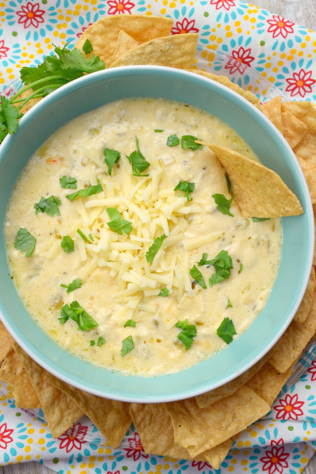 Slow Cooker Four Cheese Queso Dip Snacks and Sips
