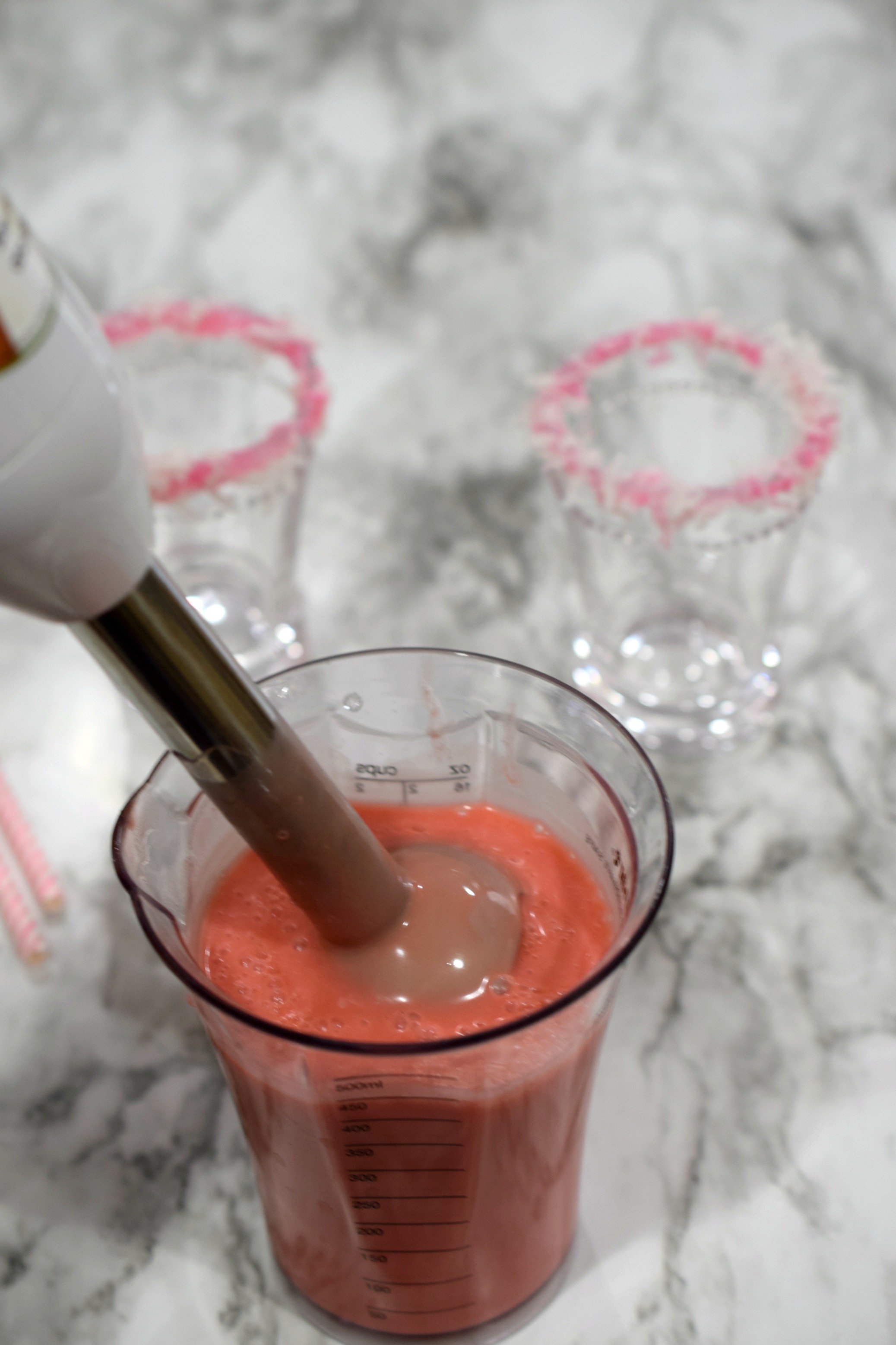 Hop into spring with a fruity Cottontail Colada Cocktail. Fruity and fun, you'll love this easy to make drink for Easter and parties.