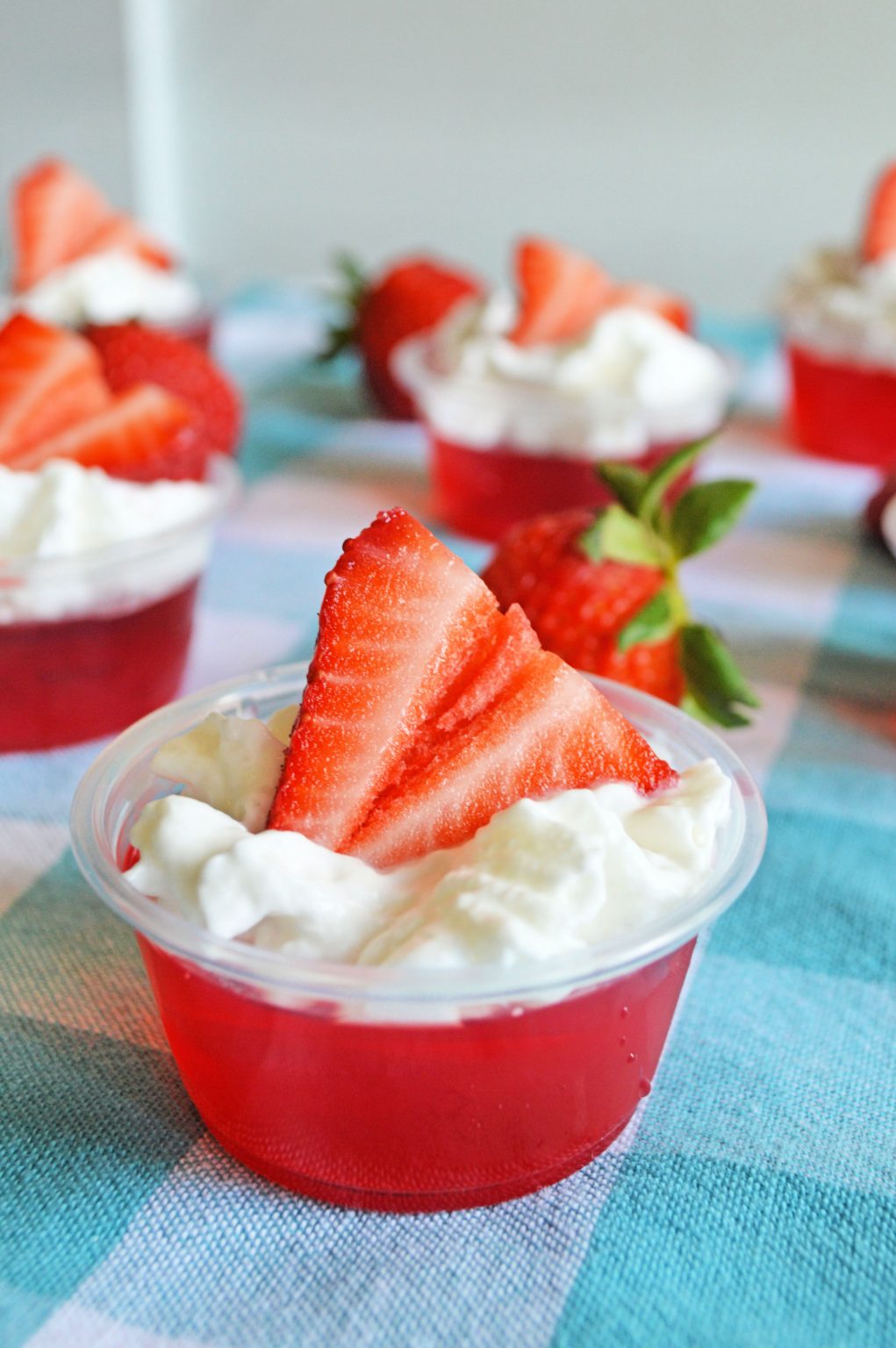 Strawberry Whipped Cream Vodka Jello Shots Snacks and Sips